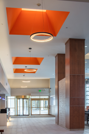 Lobby and reception area at Collegian Hotel & Suites, Syracuse NY