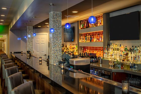Hotel amenities and common lounge area, Collegian Hotel & Suites Syracuse NY